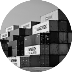 A black and white photo of shipping containers.